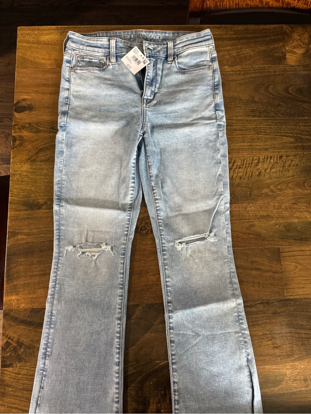 American Eagle Outfitters Light Blue Flare Jeans with Knee Rips